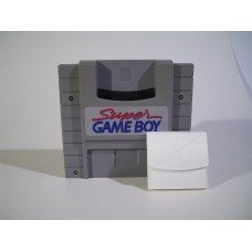 Super Game Boy cart slot dust plug.  